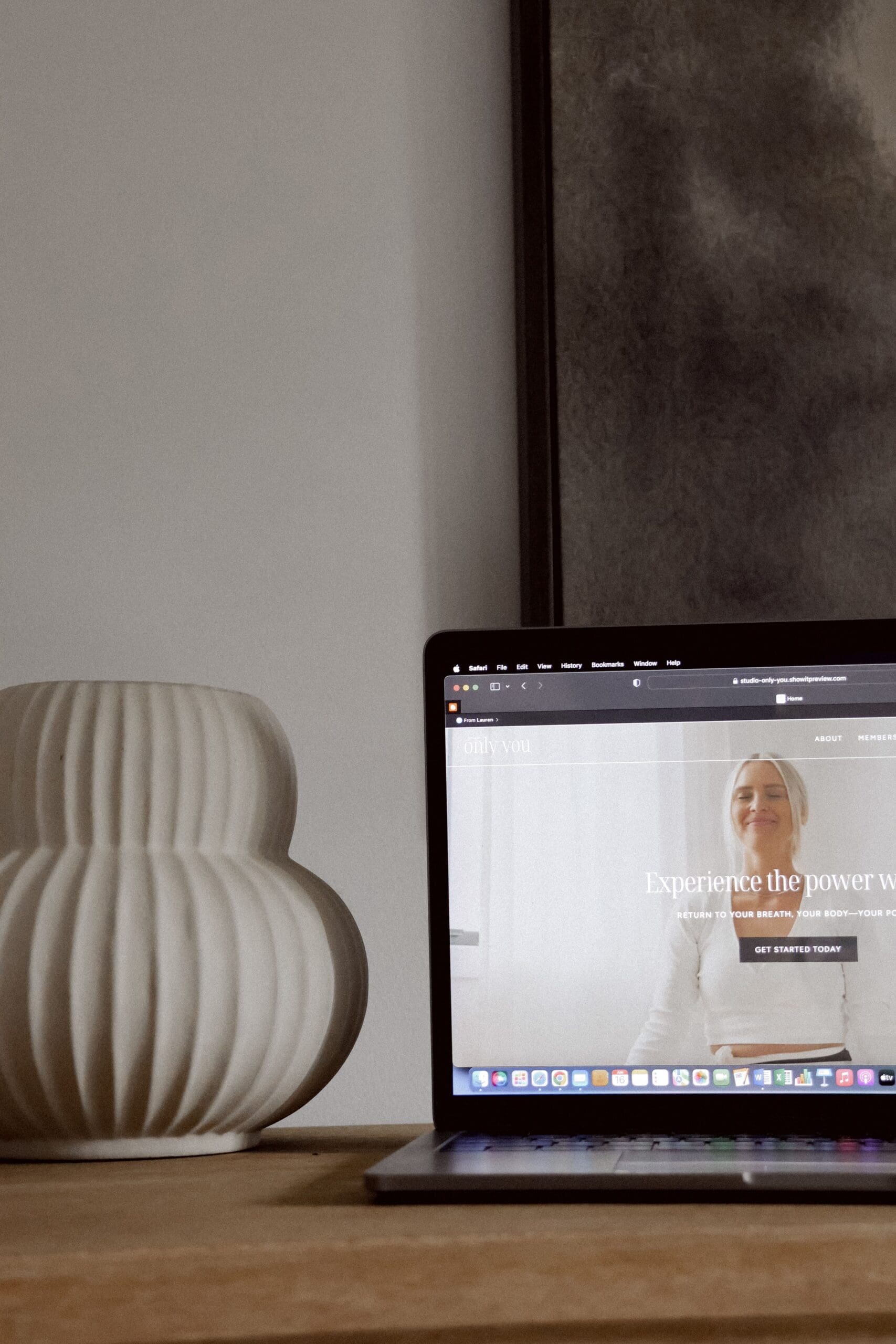 Laptop displaying a Studio Only You's website promoting mindfulness and breathwork.